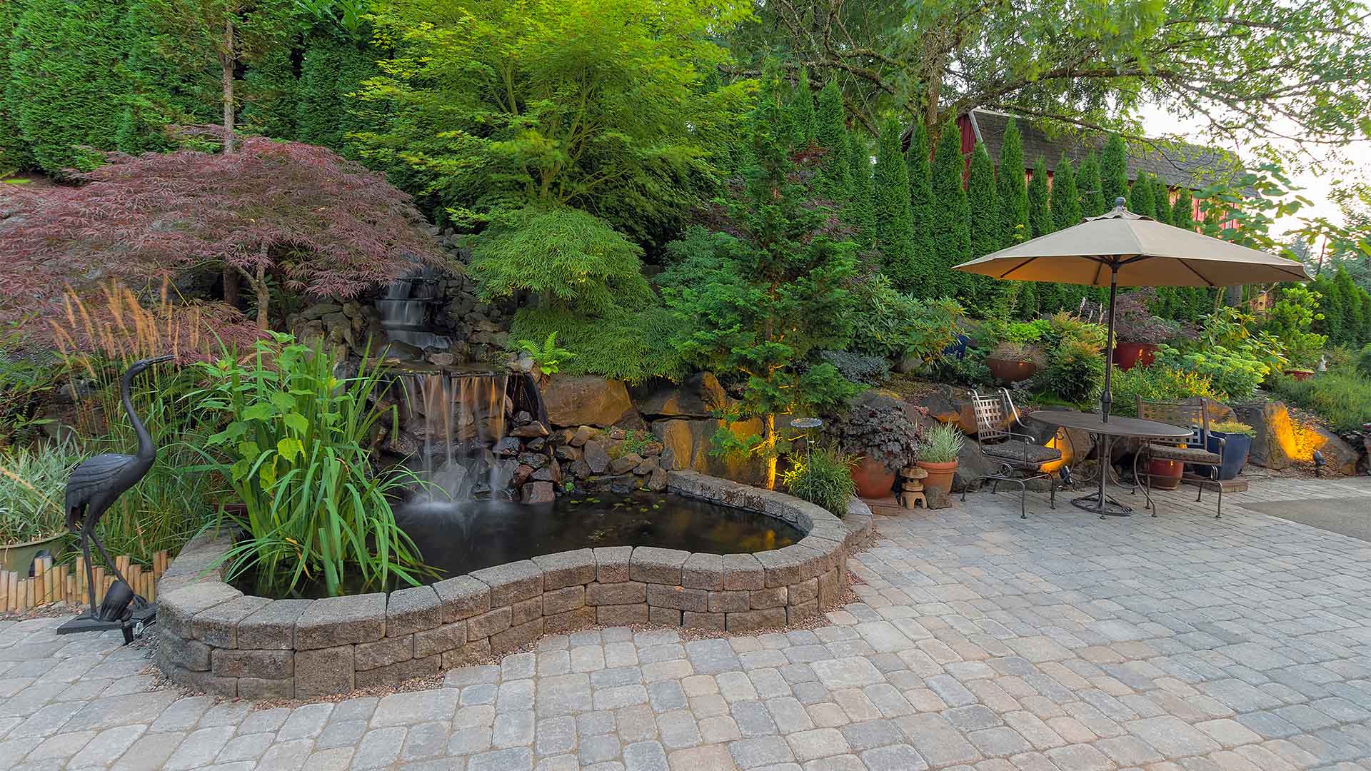 hardscaped house patio with small fountain