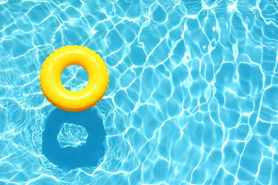 yellow donut floatie in pool
